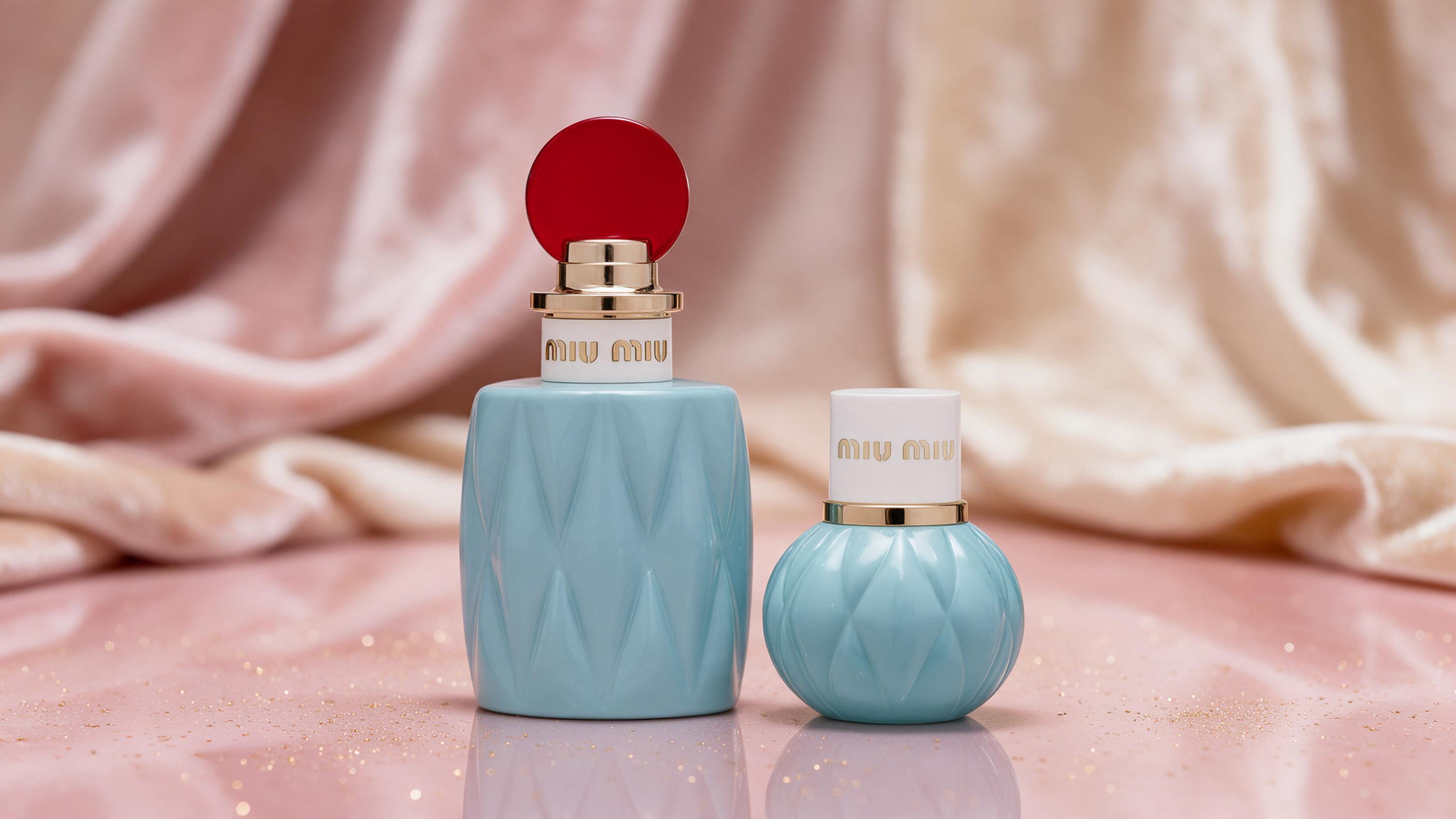an elegant pink and gold perfume bottle, Miu Miu style, luxury product photography, soft studio lighting, reflective sur