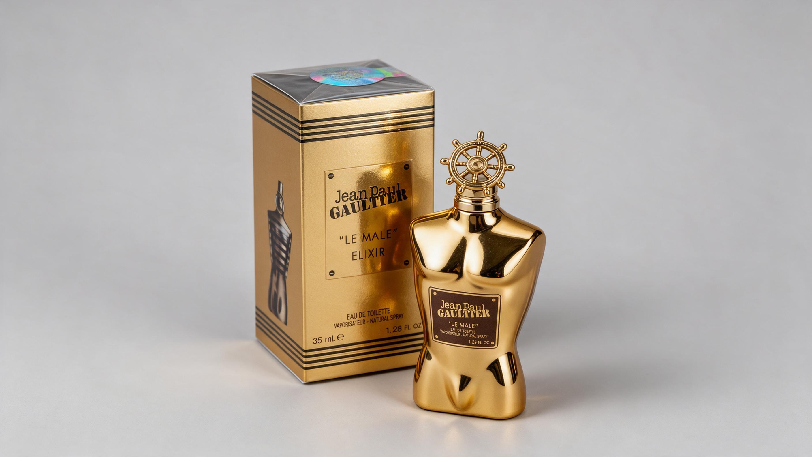 professional studio product photography of a Jean Paul Gaultier Le Male Elixir men's fragrance bottle next to its r